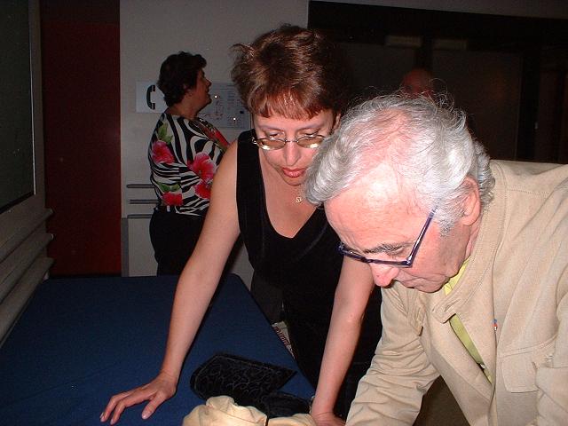 Aznavour signing autographs for Sylva Shemmassian